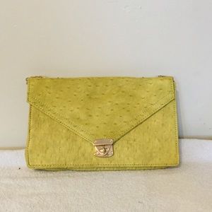 Cool lime shoulder bag with gold chain strap!